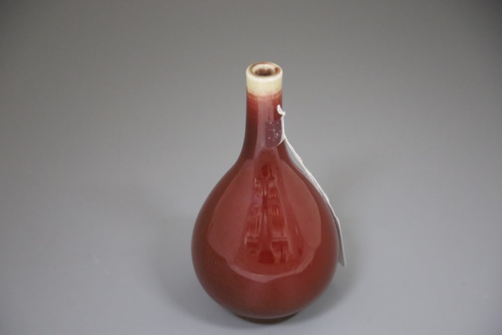 A Chinese sang de boeuf glazed langyao bottle vase, late 19th / early 20th century, height 19cm
